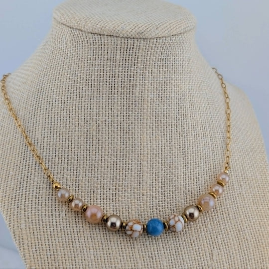 Collier Artsy bleu, bronze, crème et sable
