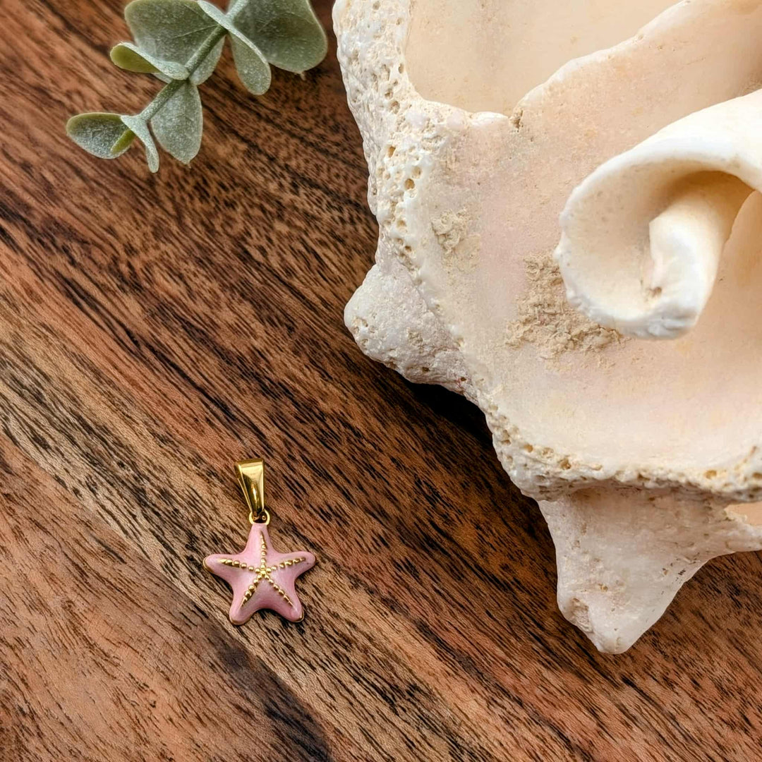 Breloque petite étoile de mer rose bébé