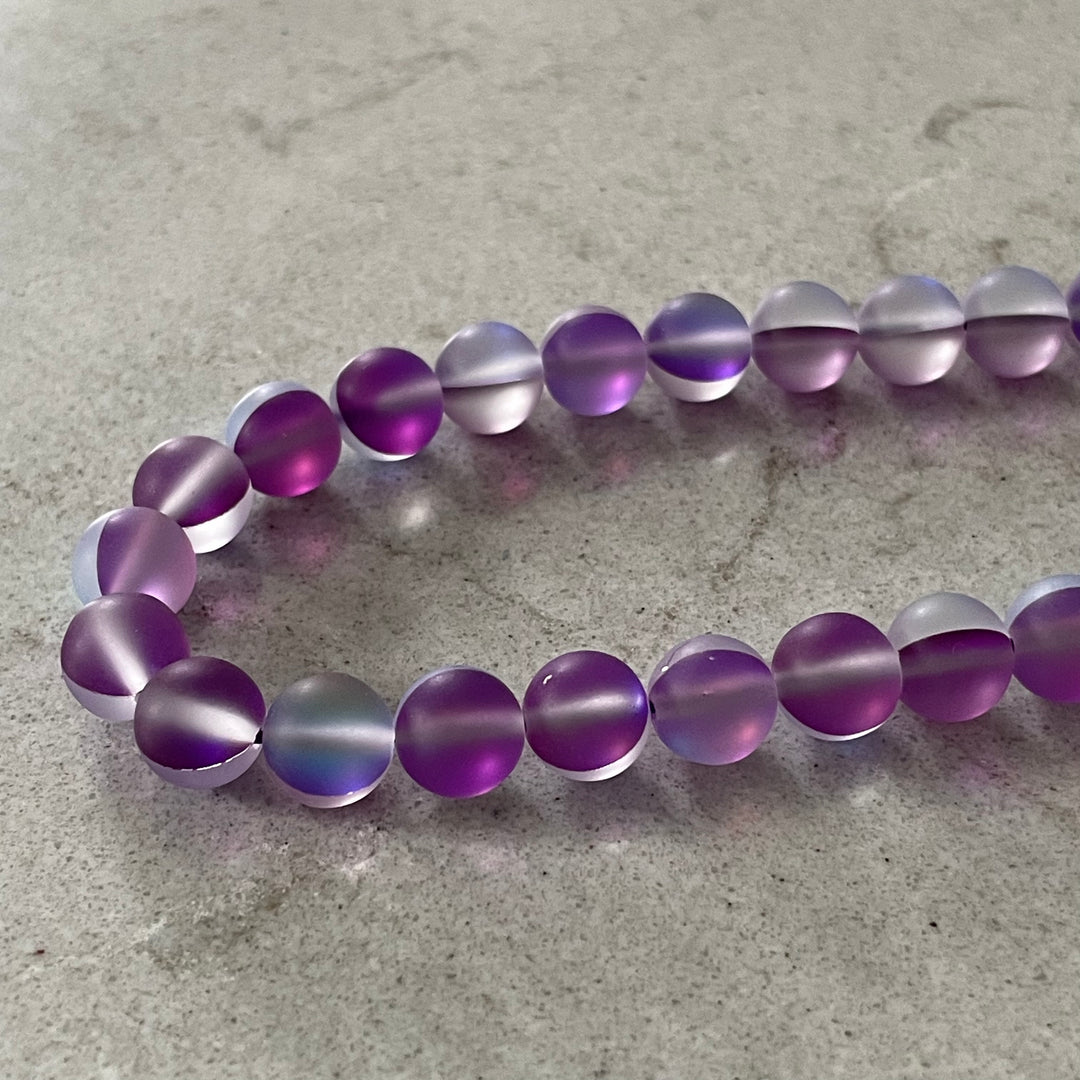 Corde de pierre de lune synthétique mauve 6 ou 8 mm