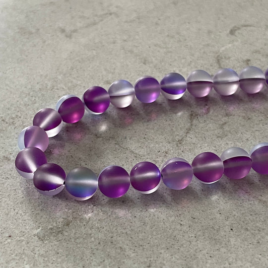 Corde de pierre de lune synthétique mauve 6 ou 8 mm