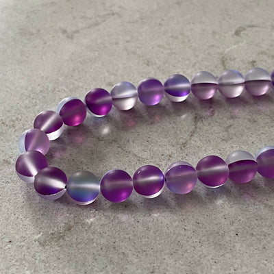 Corde de pierre de lune synthétique mauve 6 ou 8 mm