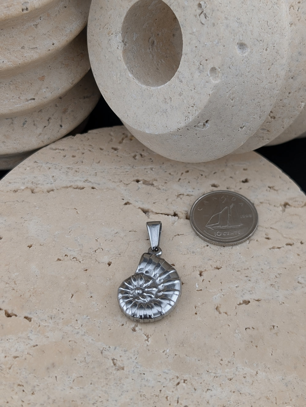 Coquillage en colimaçon or ou argent