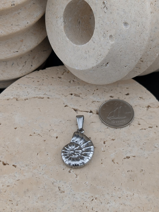 Coquillage en colimaçon or ou argent