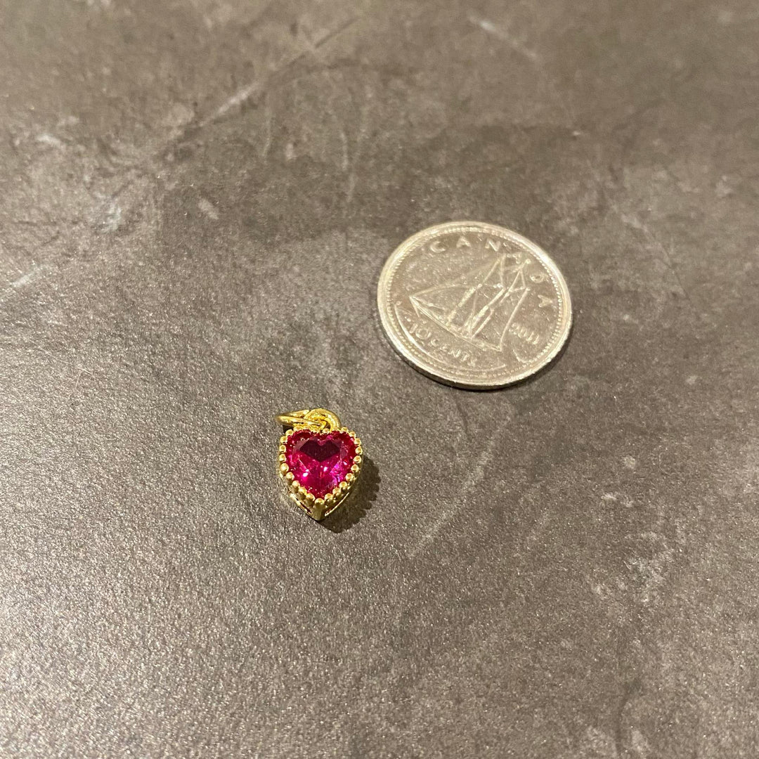 Breloque petit coeur fuschia