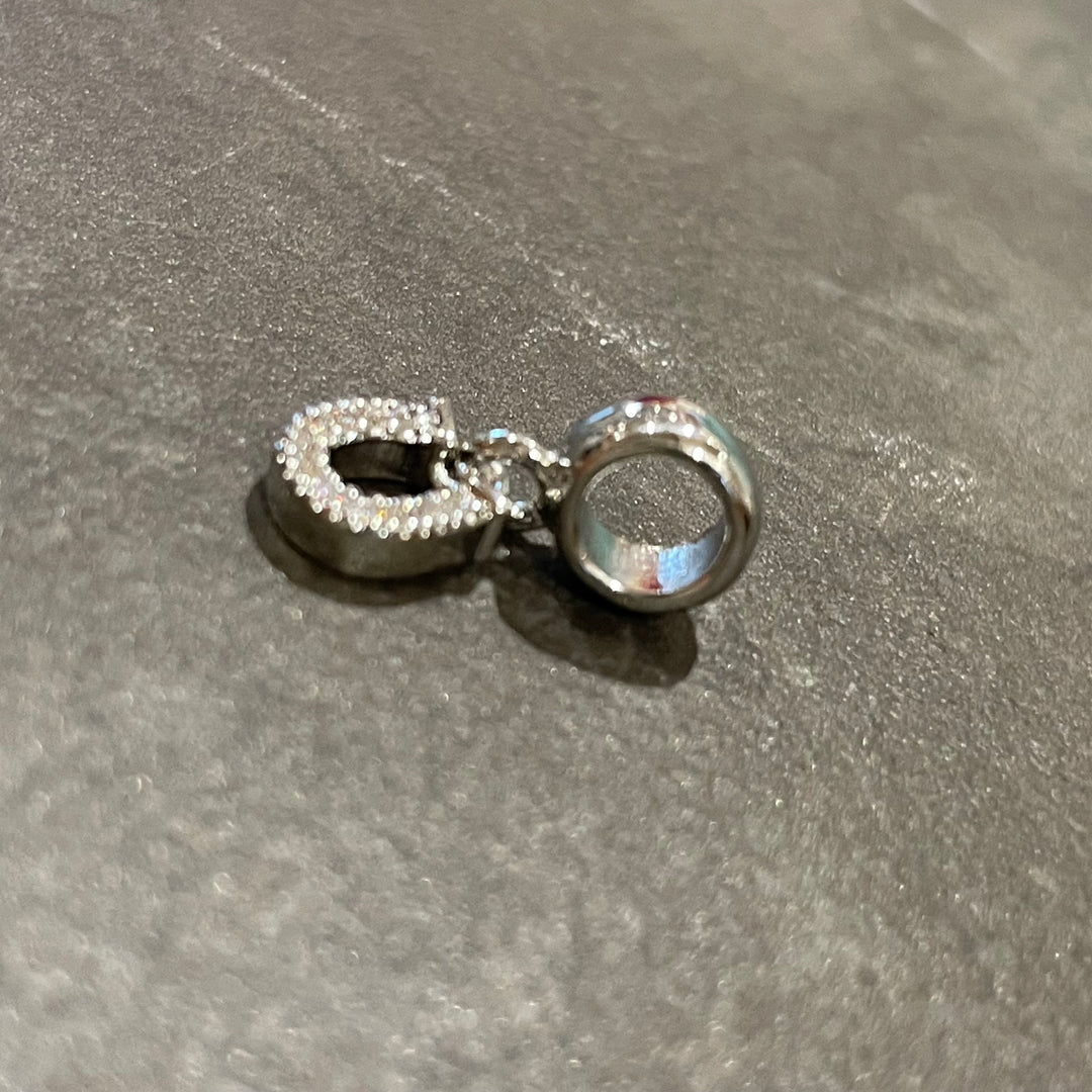 Breloque de fer à cheval argent brillant sur bague