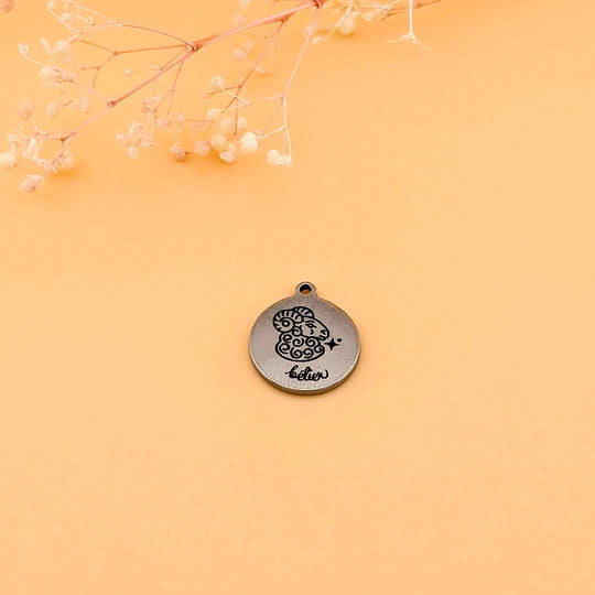 Breloque astrologique en acier inoxydable au design québecois exclusif