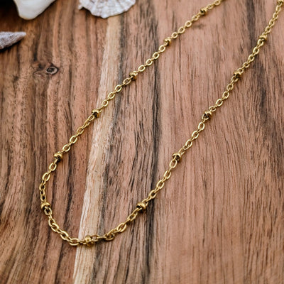 Collier à intervalle pointillé couleur doré