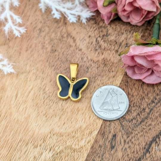 Breloque papillon qui change de couleur avec la chaleur