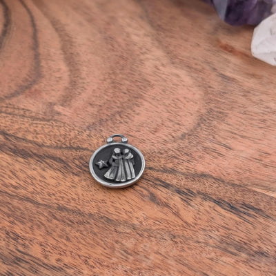 Breloque de signe astrologique et constellation double face