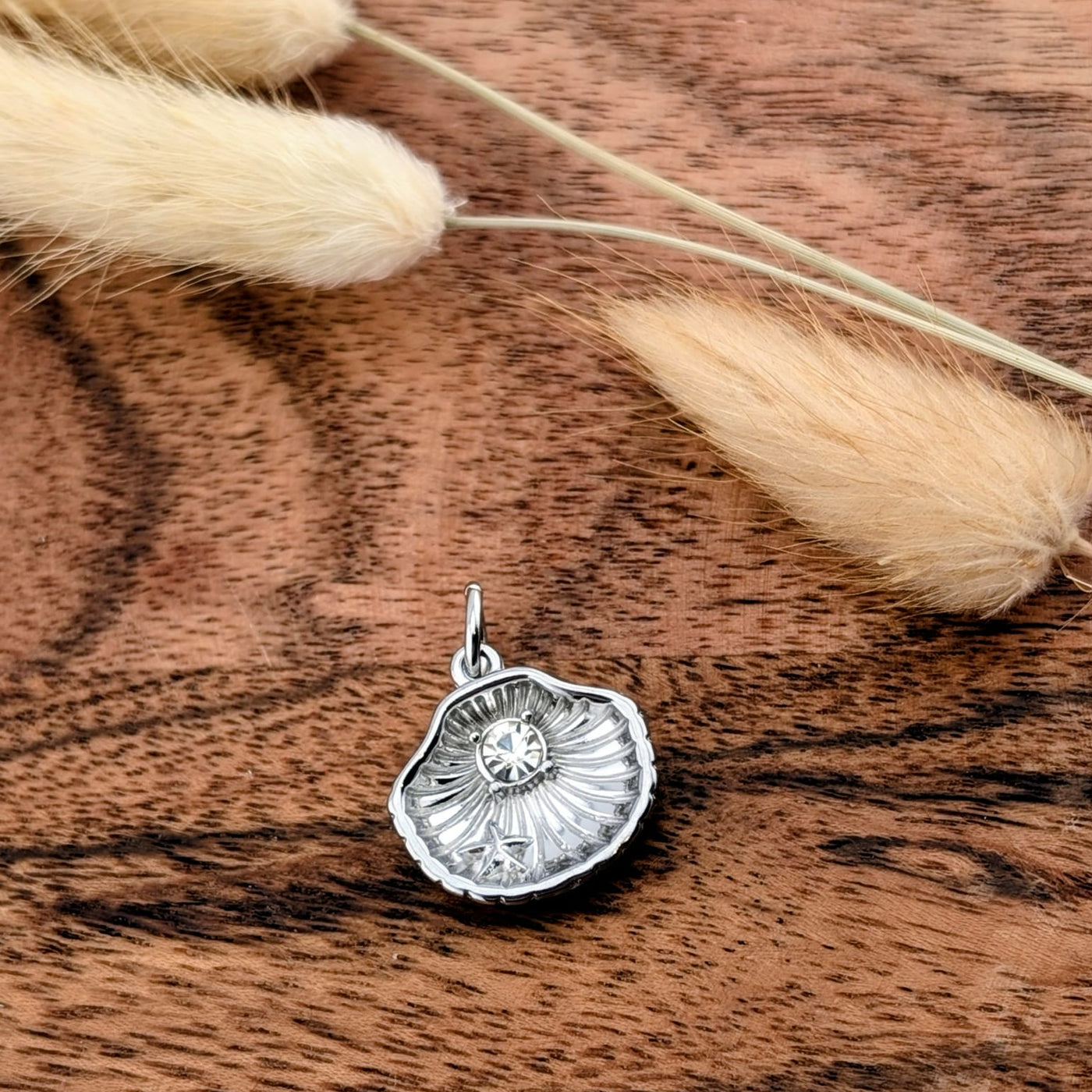 Breloque coquillage précieux argent