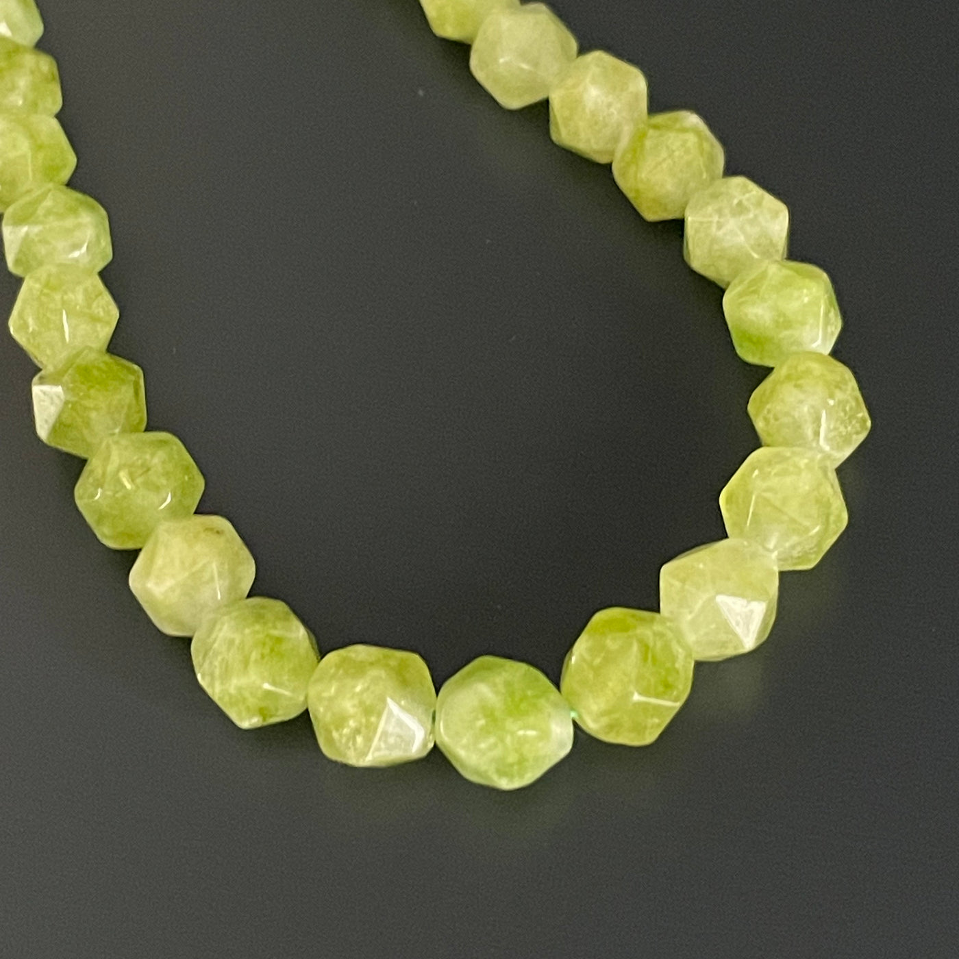 Lime jade cord, triangular faceted