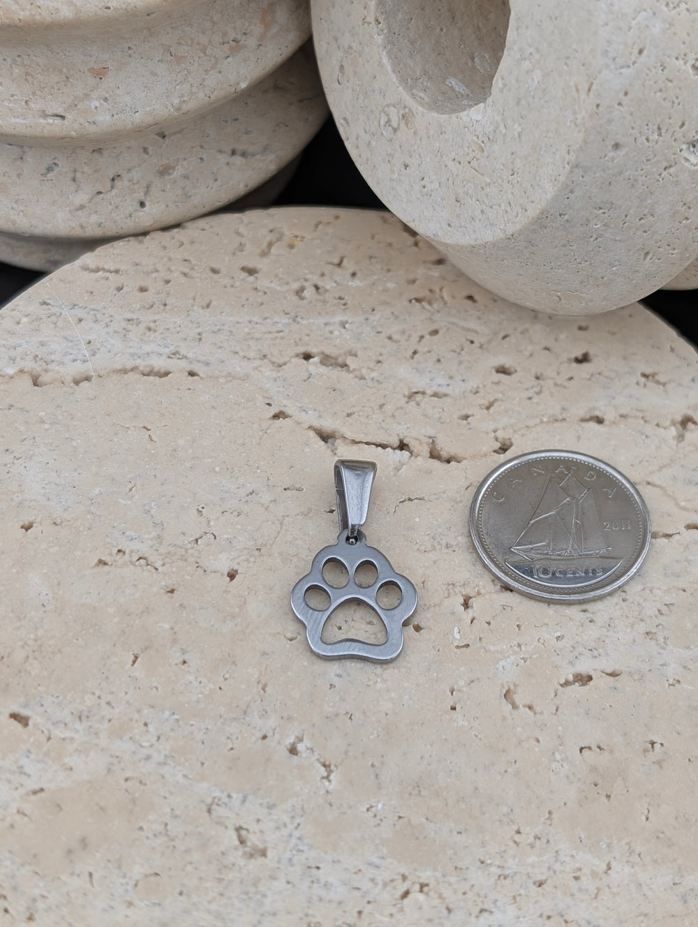 Petite patte d'animal couleur argent