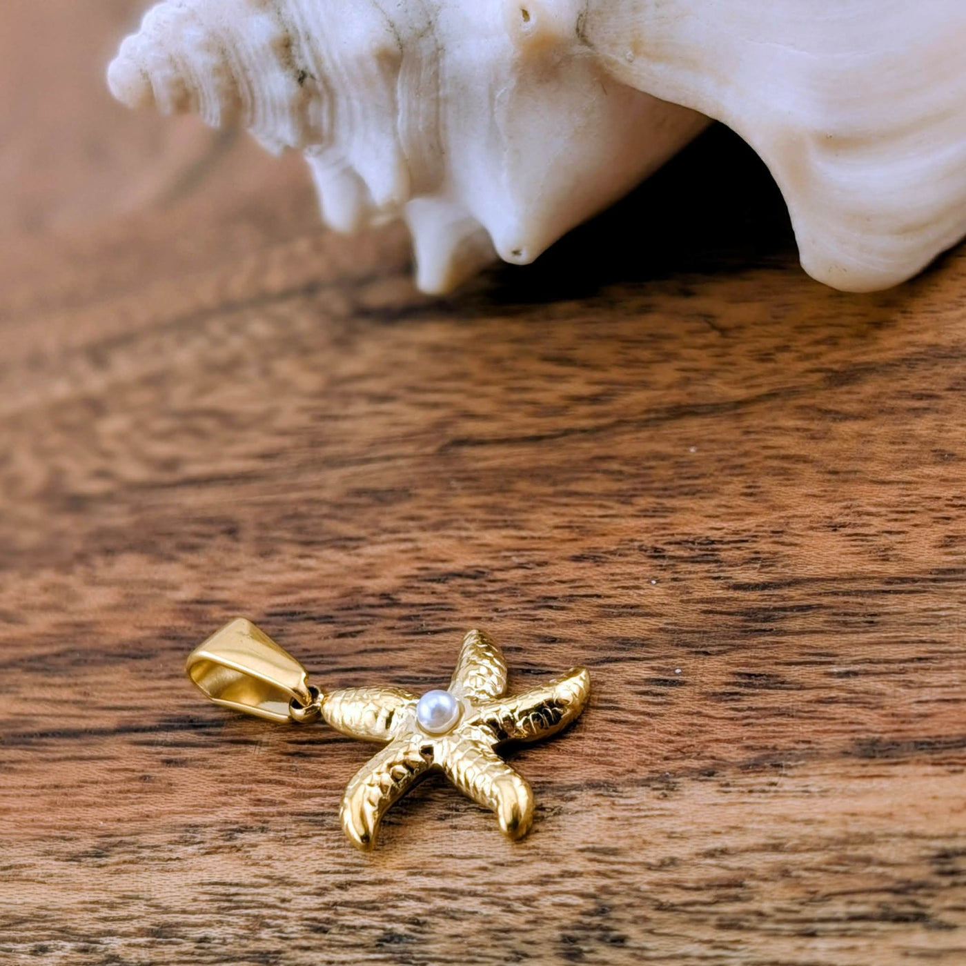 Breloque une perle d'étoile de mer