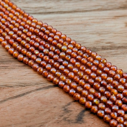 Zircon facetté disco 4 mm de couleur orangé