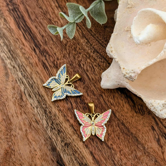 Papillon coloré rose ou bleu avec zircon