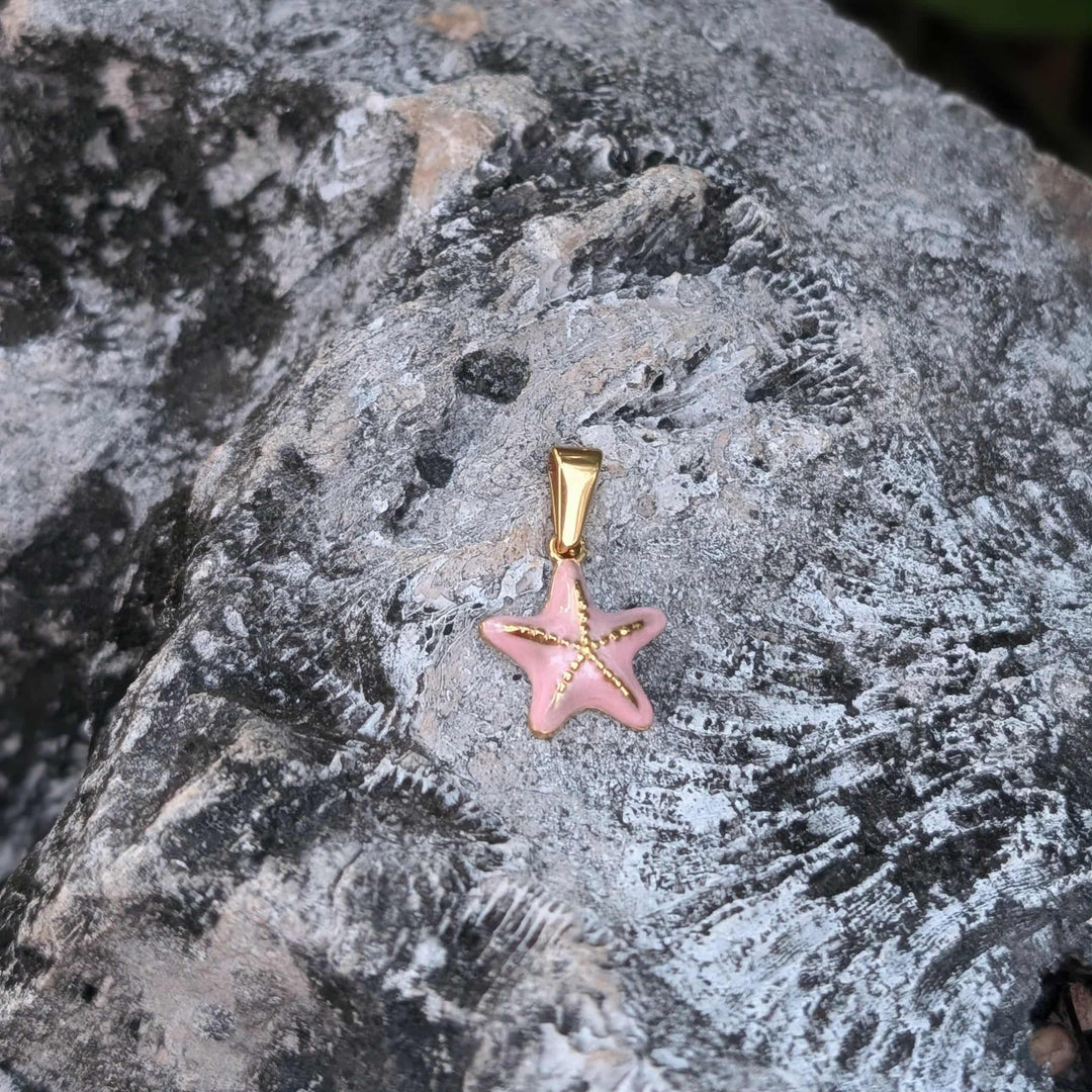 Breloque petite étoile de mer rose bébé