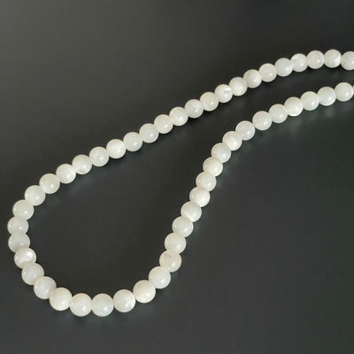 White mother-of-pearl bead string