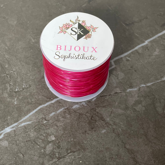 Bobine de fil élastique couleur framboise
