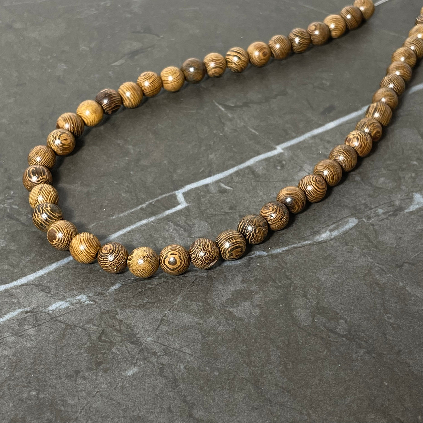 Dark wood bead rope 8 mm