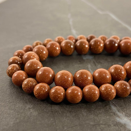 Corde de goldstone orange brulé 6 et 8 mm