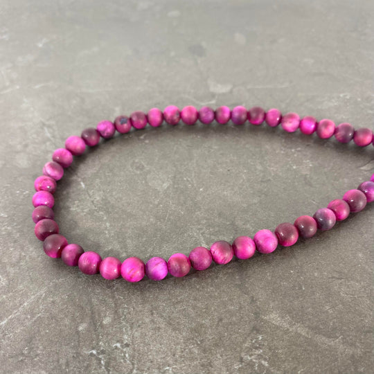 Corde oeil de tigre rose fuschia mat 6 mm