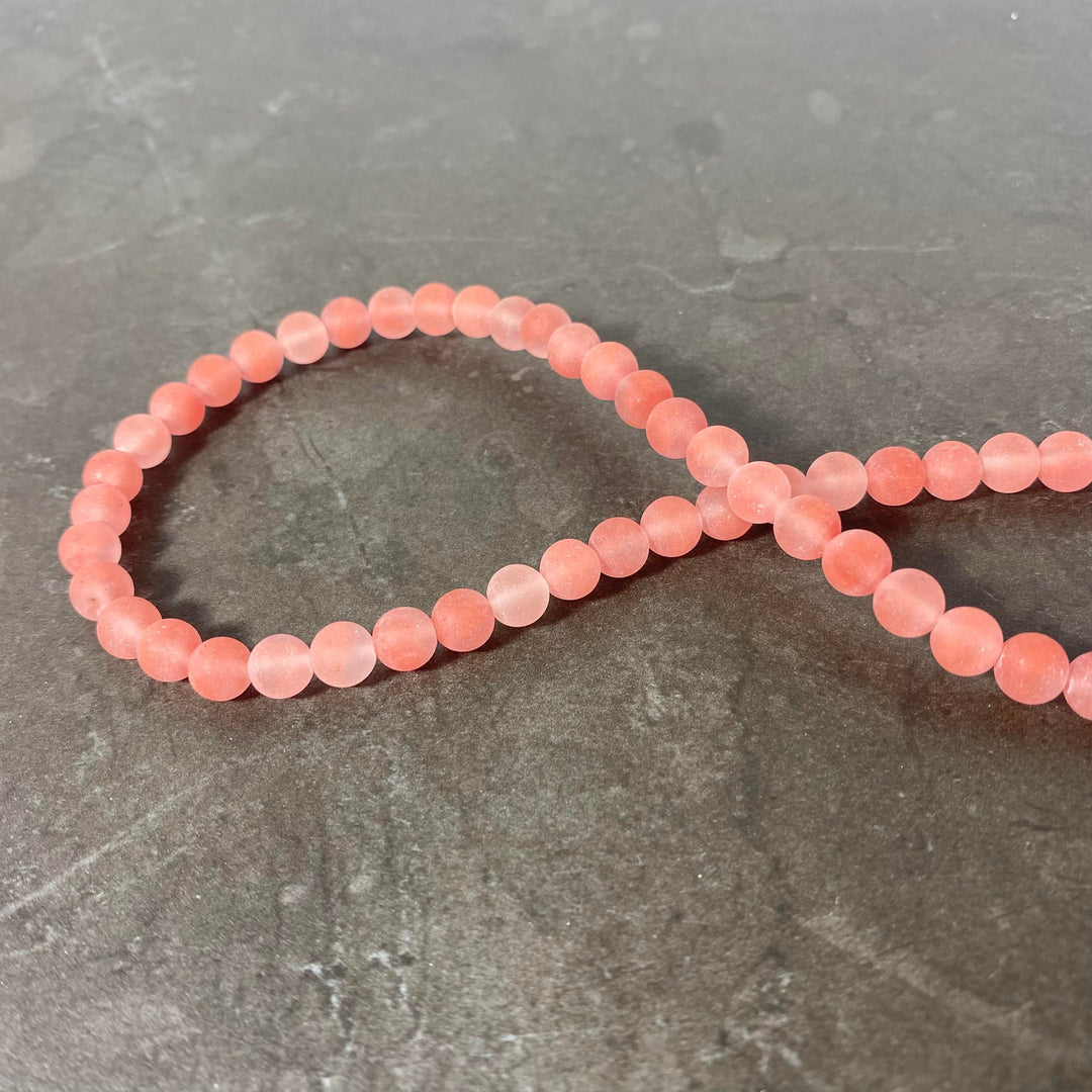 Corde de quartz cerise mat 6 ou 8 mm
