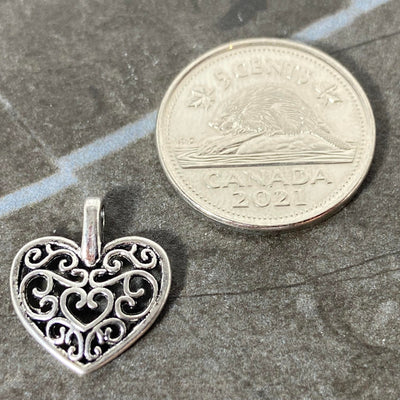 Flourish heart charm