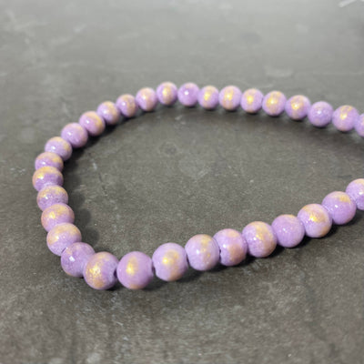 Lilac jade rope with gold reflection 6 mm