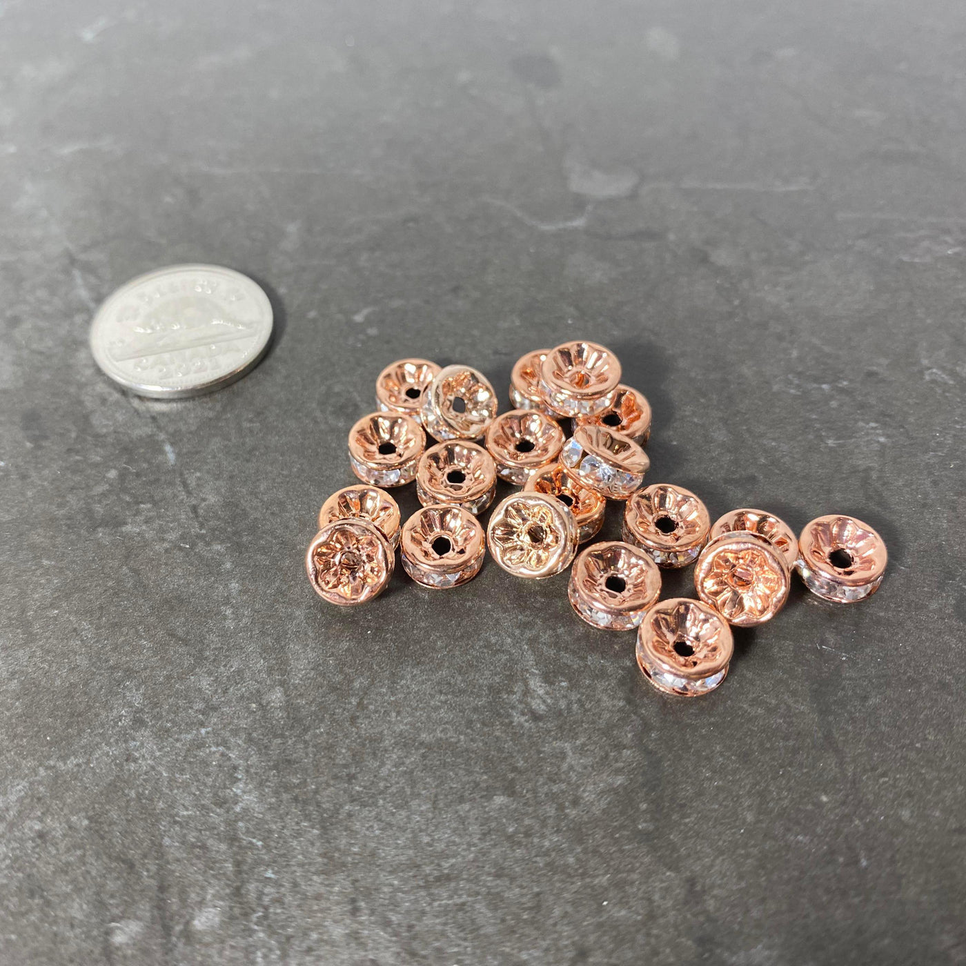 Pack of 20 rosegold spacers with shiny zircon (large)