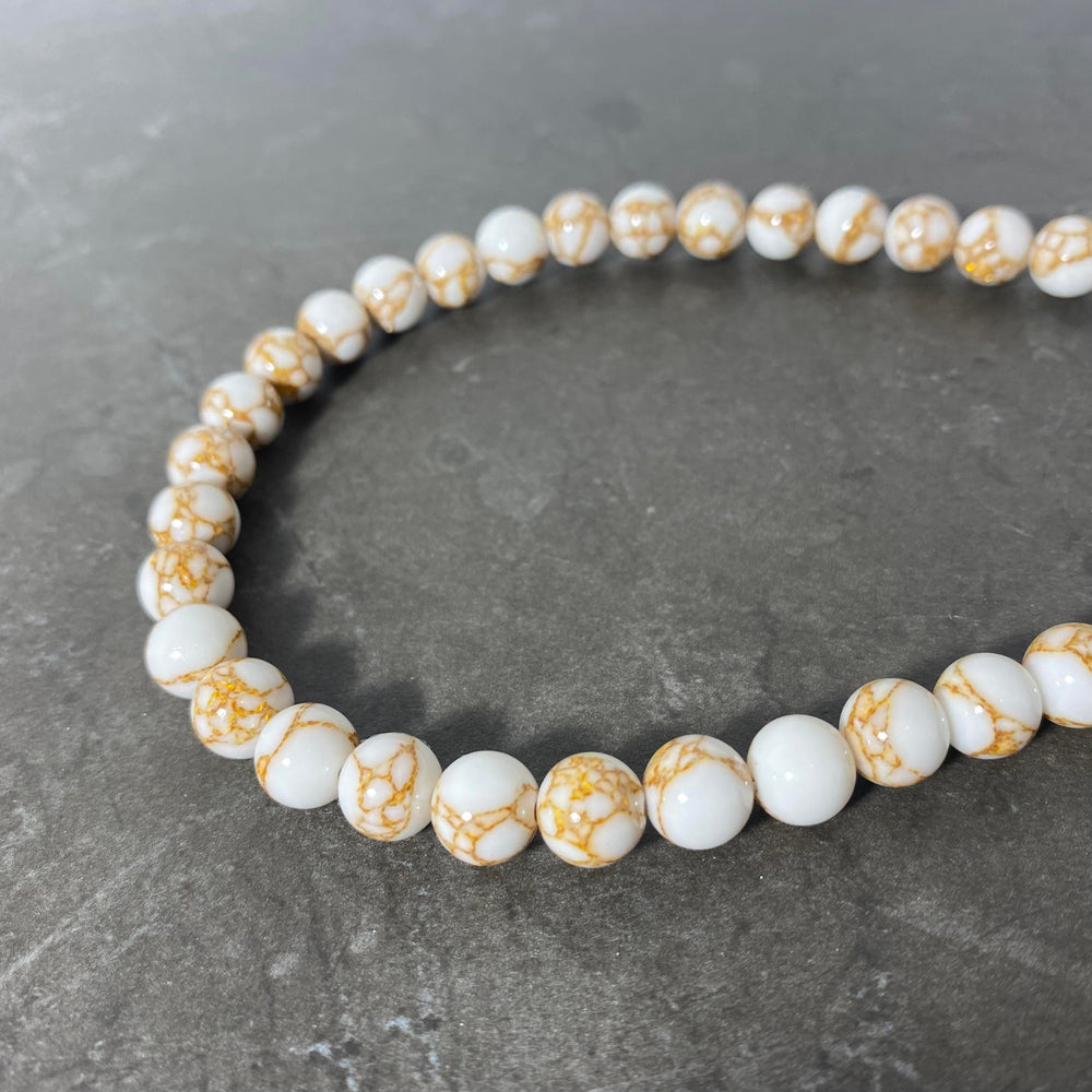 Corde d'imitation de jaspe crème avec veinure doré 6 ou 8mm