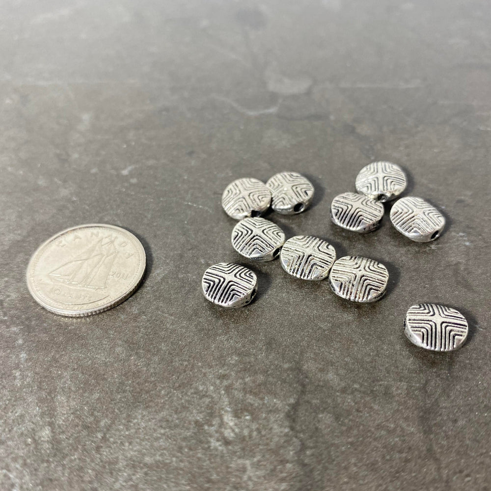 Lot de pastilles argenté avec motif gravé