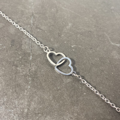 Our intertwined hearts necklace