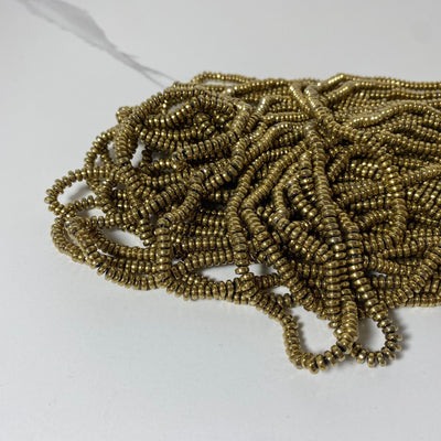 Corde de rondelles d'hématite dorée de 4 mm