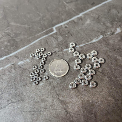 Set of silver stainless steel washer spacers